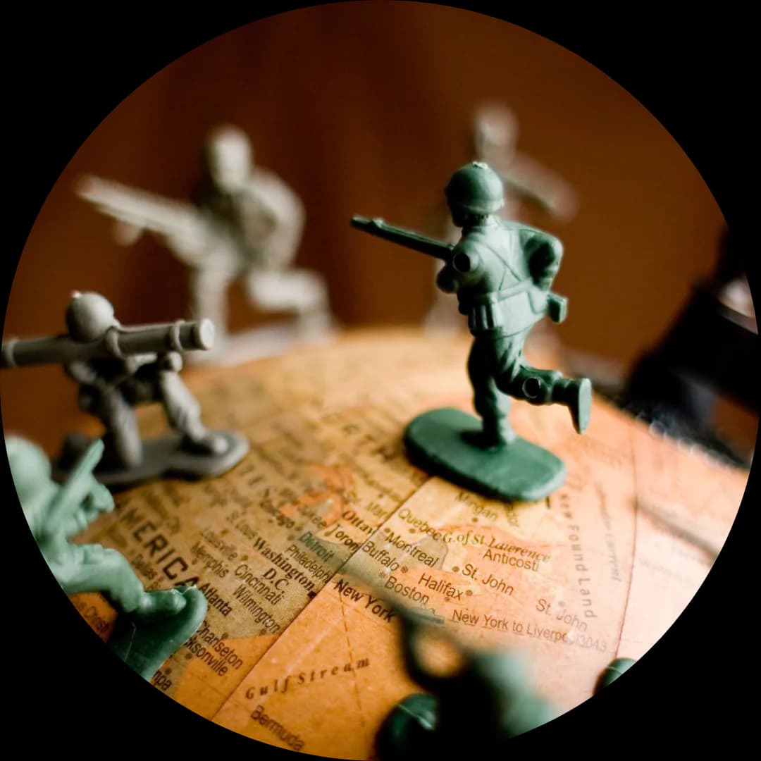 Toy soldiers on a globe