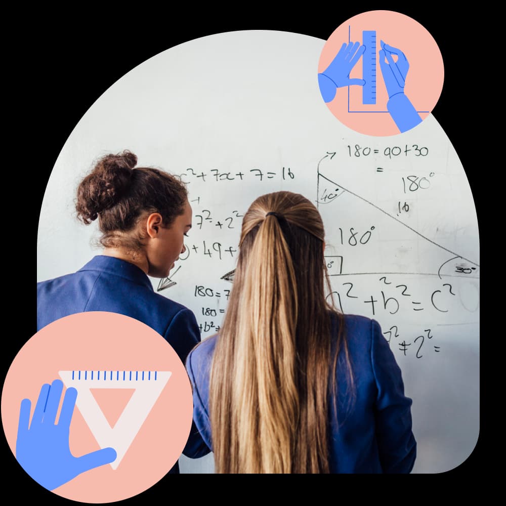 Students working through a maths problem on a whiteboard